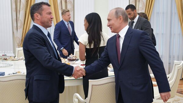 July 6, 2018. Russian President Vladimir Putin during a meeting with world football legends. Left - German footballer Lothar Matthaus - Sputnik International