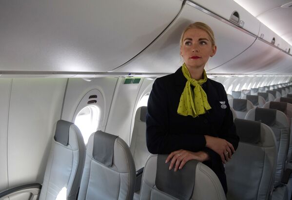 An air hostess working with Latvian airBaltic - Sputnik International