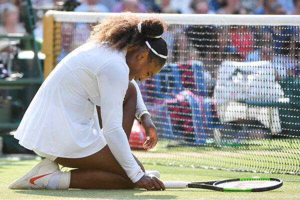 Tennis - Wimbledon - All England Lawn Tennis and Croquet Club, London, Britain - July 14, 2018. Serena Williams of the U.S. reacts during the women's singles final against Germany's Angelique Kerber Tennis - Wimbledon - All England Lawn Tennis and Croquet Club, London, Britain - July 14, 2018. Serena Williams of the U.S. reacts during the women's singles final against Germany's Angelique Kerber - Sputnik International