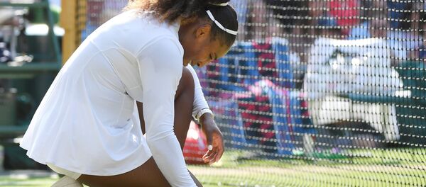 Tennis - Wimbledon - All England Lawn Tennis and Croquet Club, London, Britain - July 14, 2018. Serena Williams of the U.S. reacts during the women's singles final against Germany's Angelique Kerber - Sputnik International