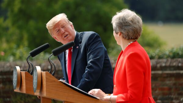 U.S. President Donald Trump and British Prime Minister Theresa May hold a press conference after their meeting at Chequers in Buckinghamshire, Britain July 13, 2018 - Sputnik International