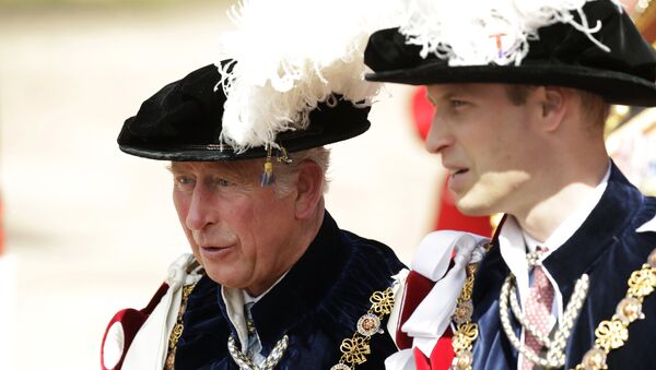 Britain's Prince Charles, in his role as a Royal Knight Companion of the Garter and his son Prince William, in his role as a Knight Companion walk in the procession to the Order of The Garter Service at Windsor Castle in Windsor, England, Monday, June 18, 2018 - Sputnik International