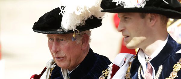 Britain's Prince Charles, in his role as a Royal Knight Companion of the Garter and his son Prince William, in his role as a Knight Companion walk in the procession to the Order of The Garter Service at Windsor Castle in Windsor, England, Monday, June 18, 2018 - Sputnik International