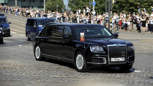 The motorcade and Kortezh limousine carrying the President of the Russian Federation Vladimir Putin pass the Finnish Parliament in Helsinki, Finland July 16, 2018 - Sputnik International