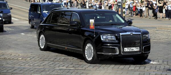 The motorcade and Kortezh limousine carrying the President of the Russian Federation Vladimir Putin pass the Finnish Parliament in Helsinki, Finland July 16, 2018 - Sputnik International