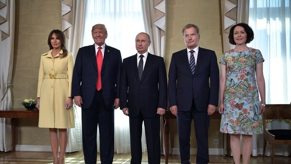 Russia's President Vladimir Putin (C), US President Donald Trump (2nd L), First lady Melania Trump (L), Finland's President Sauli Niinisto (2nd R) and his wife Jenni Haukio pose for a picture during a meeting in Helsinki, Finland July 16, 2018. - Sputnik International