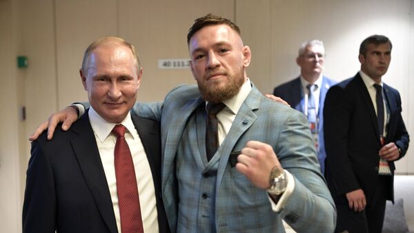 Russian President Vladimir Putin and Irish mixed martial artist Conor McGregor, right, during the break in the 2018 FIFA World Cup final match between the national teams of France and Croatia at Luzhniki Stadium - Sputnik International