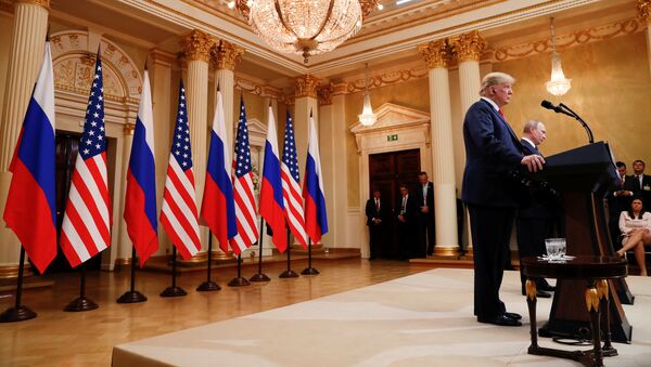 U.S. President Donald Trump and Russia's President Vladimir Putin hold a joint news conference after their meeting in Helsinki, Finland, July 16, 2018 - Sputnik International