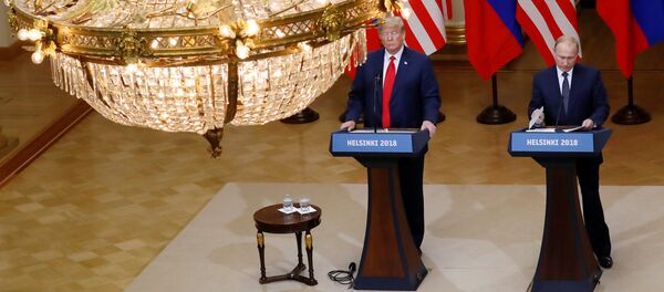 U.S. President Donald Trump and Russian President Vladimir Putin hold a joint news conference after their meeting in Helsinki, Finland, July 16, 2018 - Sputnik International