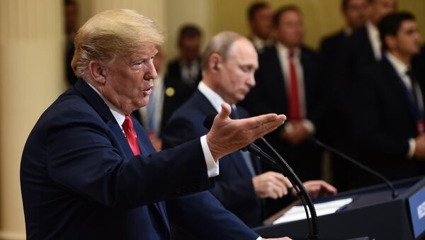 US President Donald Trump and Russia's President Vladimir Putin attend a joint press conference after a meeting at the Presidential Palace in Helsinki, on July 16, 2018 - Sputnik International