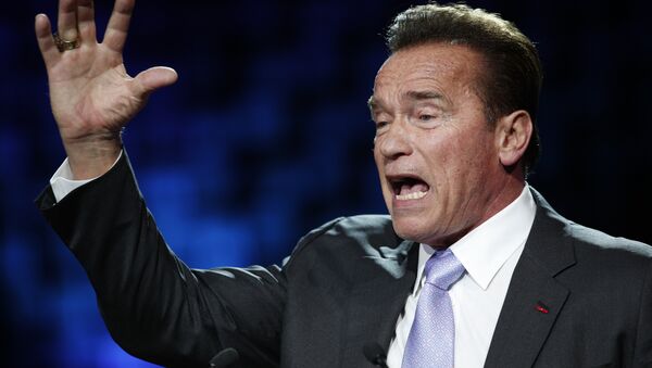 Former California Gov. Arnold Schwarzenegger delivers his speech at the One Planet Summit, in Boulogne-Billancourt, near Paris, France, Tuesday, Dec. 12, 2017. World leaders, investment funds and energy magnates promised to devote new money and technology to slow global warming at a summit in Paris that President Emmanuel Macron hopes will rev up the Paris climate accord that U.S. President Donald Trump has rejected - Sputnik International
