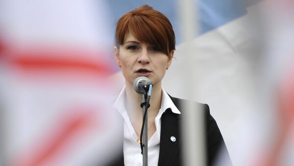 In this photo taken on Sunday, April 21, 2013, Maria Butina, leader of a pro-gun organization in Russia, speaks to a crowd during a rally in support of legalizing the possession of handguns in Moscow, Russia - Sputnik International