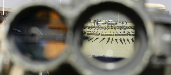 (File) This picture shows weapons handed over by Jaish al-Islam rebel fighters to the Syrian government forces in al-Dumayr, some 50 kilometres east of Damascus, on April 22, 2018 - Sputnik International