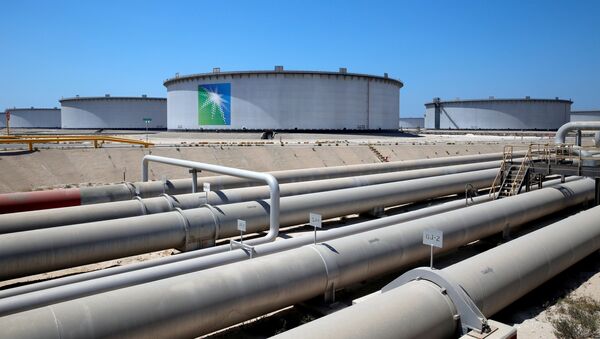 General view of Aramco tanks and oil pipe at Saudi Aramco's Ras Tanura oil refinery and oil terminal in Saudi Arabia May 21, 2018 - Sputnik International