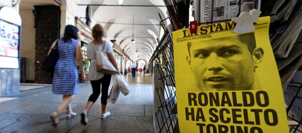 A poster reading Ronaldo chose Turin is seen in downtown Turin, Italy July 11, 2018 A poster reading Ronaldo chose Turin is seen in downtown Turin, Italy July 11, 2018 - Sputnik International