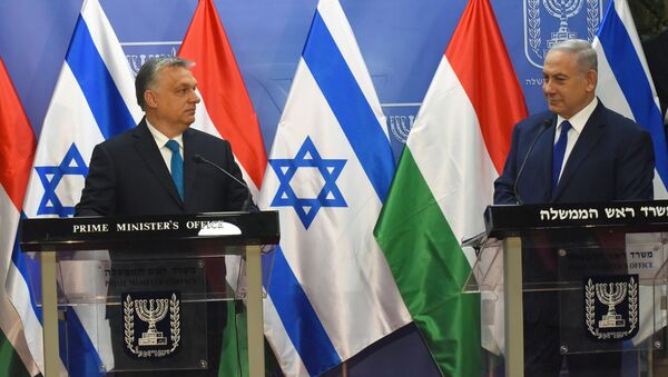 Israeli Prime Minister Benjamin Netanyahu speaks during a joint statment with Hungarian Prime Minister Viktor Orban , at the prime minister's office in Jerusalem, July 19, 2018 - Sputnik International