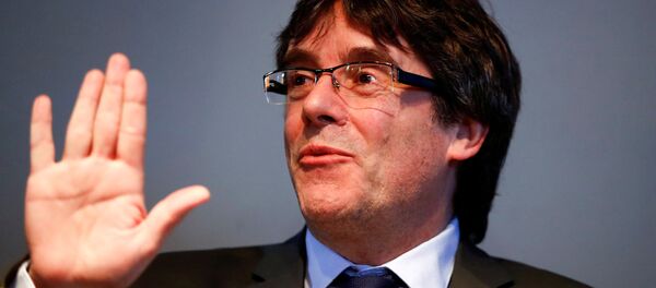 Catalonia's former leader Carles Puigdemont gestures during a news conference in Berlin, Germany, April 7, 2018 - Sputnik International