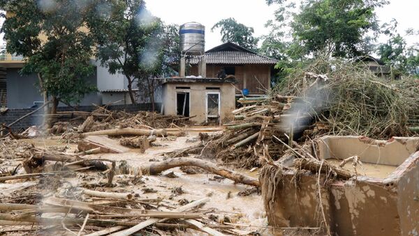 A general view shows debris in a village damaged by flash flooding in Vietnam's Yen Bai province on July 21, 2018 - Sputnik International