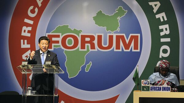 Dec. 4, 2015 file photo, Chinese President Xi Jinping, left, delivers his speech during the opening ceremony of the Johannesburg Summit for the Forum on China-Africa Cooperation at the Sandton Convention Centre in Johannesburg - Sputnik International