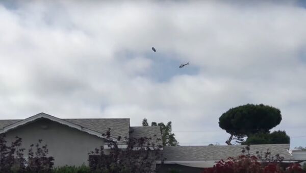 What Just Happened Over LA? [LAPD] Helicopter Surrounds UFO? 2018 - Sputnik International