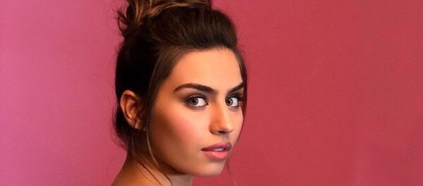 Amine Gulse - Sputnik International