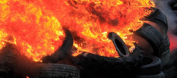 Burning tires (File) - Sputnik International
