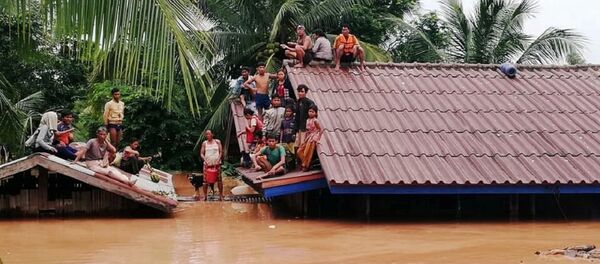 Villagers evacuate after the Xepian-Xe Nam Noy hydropower dam collapsed in Attapeu province, Laos July 24, 2018 Villagers evacuate after the Xepian-Xe Nam Noy hydropower dam collapsed in Attapeu province, Laos July 24, 2018 - Sputnik International