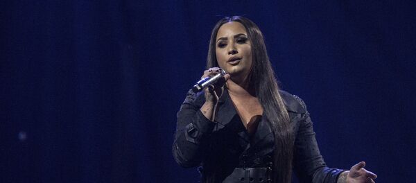 Demi Lovato performs on stage in concert at the o2 in east London, Monday, June 25, 2018. Demi Lovato performs on stage in concert at the o2 in east London, Monday, June 25, 2018. - Sputnik International