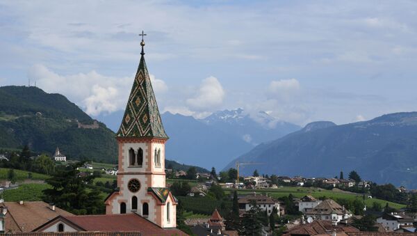 A picture taken on June 6, 2018 shows a partial view of the small village and the church of St. Joseph of St. Michael Eppan, South Tyrol, northern Italy - Sputnik International