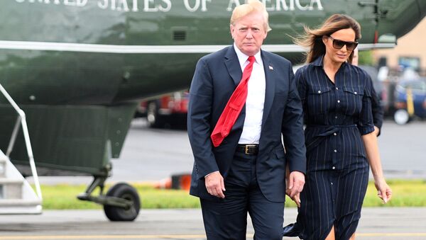 U.S. President Donald Trump and First Lady Melania Trump disembark Marine One upon departure from Morristown in New Jersey, U.S., July 22, 2018 - Sputnik International