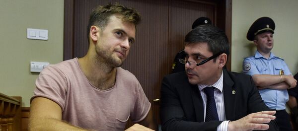 Russian Pussy Riot punk group member Pyotr Verzilov, who was recently jailed for 15 days in police cells after a pitch invasion at the World Cup final, attends an appeal hearing at a court in Moscow on July 23, 2018 - Sputnik International