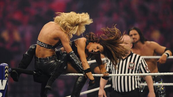 (File) WWE Divas LayCool and Trish Stratus during WrestleMania XXVII at the Georgia Dome in Atlanta, Georgia on Sunday, April 3, 2011 - Sputnik International