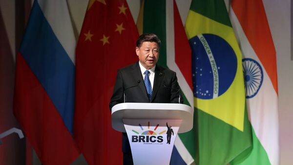 Chinese President Xi Jinping delivers his speech at the opening of the BRICS Summit in Johannesburg Wednesday, July 25 2017 - Sputnik International