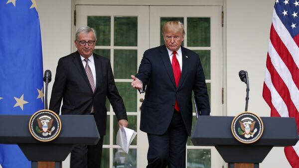 President Donald Trump and European Commission president Jean-Claude Juncker arrive to speak in the Rose Garden of the White House, Wednesday, July 25, 2018, in Washington. - Sputnik International