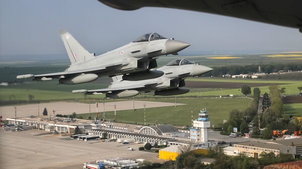 (File) Royal Air Force Eurofighter Typhoon fighter jets fly above the Mihail Kogalniceanu airport, eastern Romania, Friday, April 27, 2018 - Sputnik International