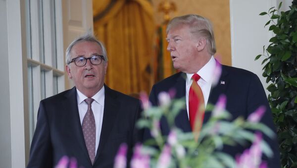 President Donald Trump, right, and European Commission president Jean-Claude Juncker arrive to speak in the Rose Garden of the White House, Wednesday, July 25, 2018, in Washington - Sputnik International