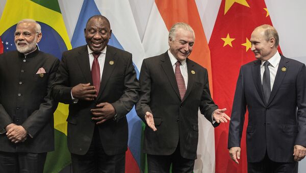 From left, Indian Prime Minister Narendra Modi, South African President Cyril Ramaphosa, Brazil's President Michel Temer and Russia's President Vladimir Putin, get ready for a group photo at the BRICS Summit in Johannesburg, South Africa, Thursday, July 26, 2018. Putin arrived in South Africa Thursday, the last head of state to arrive for the Summit - Sputnik International