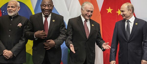 From left, Indian Prime Minister Narendra Modi, South African President Cyril Ramaphosa, Brazil's President Michel Temer and Russia's President Vladimir Putin, get ready for a group photo at the BRICS Summit in Johannesburg, South Africa, Thursday, July 26, 2018. Putin arrived in South Africa Thursday, the last head of state to arrive for the Summit From left, Indian Prime Minister Narendra Modi, South African President Cyril Ramaphosa, Brazil's President Michel Temer and Russia's President Vladimir Putin, get ready for a group photo at the BRICS Summit in Johannesburg, South Africa, Thursday, July 26, 2018. Putin arrived in South Africa Thursday, the last head of state to arrive for the Summit - Sputnik International