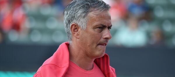 Manchester United's coach Jose Mourinho walks on the pitch before the start of the International Champions Cup match between Manchester United and AC Milan at the StubHub Center in Carson, California, on July 25, 2018 Manchester United's coach Jose Mourinho walks on the pitch before the start of the International Champions Cup match between Manchester United and AC Milan at the StubHub Center in Carson, California, on July 25, 2018 - Sputnik International