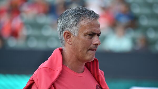 Manchester United's coach Jose Mourinho walks on the pitch before the start of the International Champions Cup match between Manchester United and AC Milan at the StubHub Center in Carson, California, on July 25, 2018 - Sputnik International