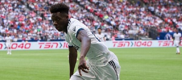 Alphonso Davies - Sputnik International