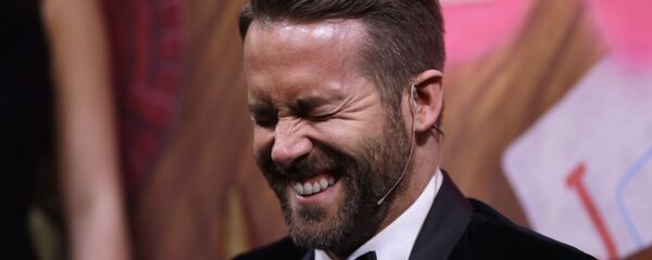 Actor Ryan Reynolds during a roast at Harvard University in Cambridge, Mass., Friday, Feb. 3, 2017. Actor Ryan Reynolds during a roast at Harvard University in Cambridge, Mass., Friday, Feb. 3, 2017. - Sputnik International