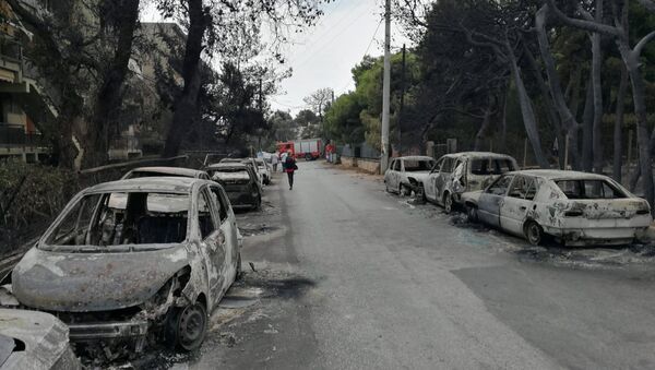 The aftermath of a wildfire is seen in Mati, Greece July 24, 2018 in this photo obtained from social media on July 27, 2018 - Sputnik International