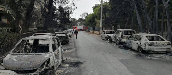 The aftermath of a wildfire is seen in Mati, Greece July 24, 2018 in this photo obtained from social media on July 27, 2018 The aftermath of a wildfire is seen in Mati, Greece July 24, 2018 in this photo obtained from social media on July 27, 2018 - Sputnik International
