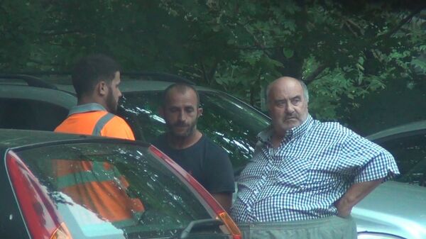 Leonard Powell (far right) and one of his Albanian accomplices caught on camera by Operation Sugate Leonard Powell (far right) and one of his Albanian accomplices caught on camera by Operation Sugate - Sputnik International