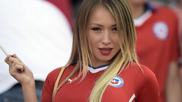 Chilean model Daniella Chavez cheers for her team before the start of the 2015 Copa America football championship final Argentina vs Chile, in Santiago, Chile, on July 4, 2015 - Sputnik International