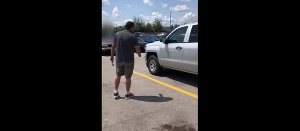 Ontario man arrested and charged after threatening a couple outside of a Walmart - Sputnik International