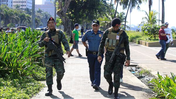 Members of the Philippine National Police (PNP) Special Action Force patrol after an Improvised Explosive Device (IED) was found near the U.S Embassy in metro Manila, Philippines November 28, 2016. - Sputnik International