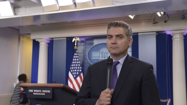 Jim Acosta of CNN waits to do a live shot following the daily briefing at the White House in Washington, Wednesday, Aug. 2, 2017. - Sputnik International