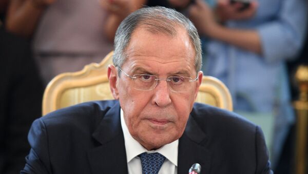 Russian Foreign Minister Sergei Lavrov during talks with Japanese сcounterpart Taro Kono and Japanese Defense Minister Itunori Onodara in the 2 + 2 format. - Sputnik International